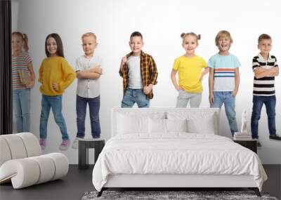 Group of cute school children on white background Wall mural