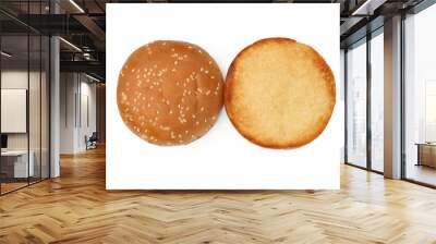 Halves of grilled burger bun isolated on white, top view Wall mural