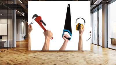 Hands of people with different tools isolated on white Wall mural