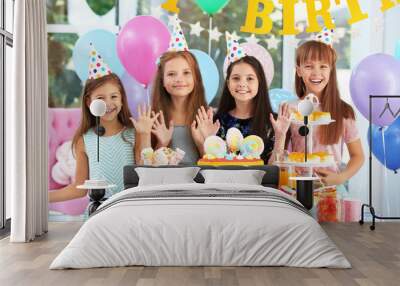 Happy children at birthday party in decorated room Wall mural