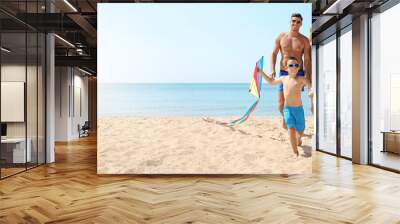 Happy family with kite at beach on sunny day, space for text. Banner design Wall mural