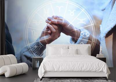 Horoscope compatibility. Loving couple holding hands outdoors and zodiac wheel Wall mural