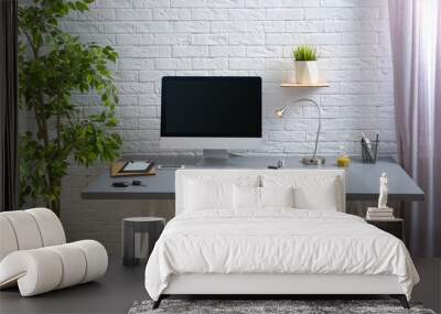 Interior of comfortable work place with computer on table at home Wall mural