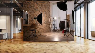 Interior of modern photo studio with professional equipment Wall mural