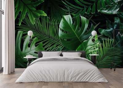 Many bright green tropical leaves as background Wall mural