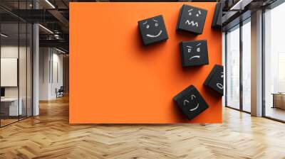 Many cubes with different emotions on orange background, flat lay and space for text. Emotional management Wall mural