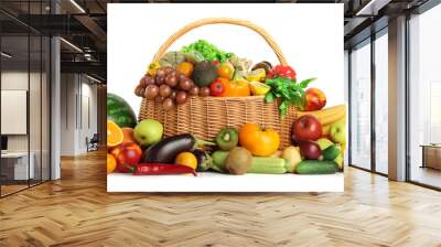 Many different fruits and vegetables in wicker basket isolated on white Wall mural