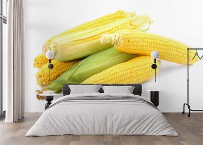 Many fresh ripe corncobs isolated on white Wall mural