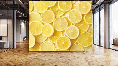 Many slices of fresh ripe lemons as background Wall mural