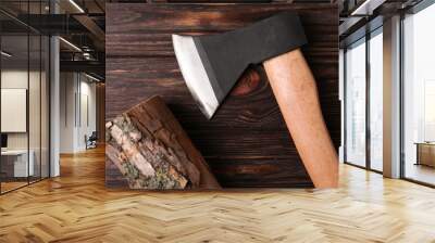 Metal ax and wooden log on table, flat lay Wall mural