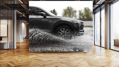 Modern car driving outdoors on rainy day Wall mural