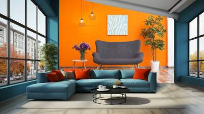 Modern living room interior with comfortable gray sofa near color wall Wall mural