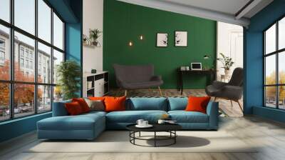 Modern living room interior with workplace near green wall Wall mural