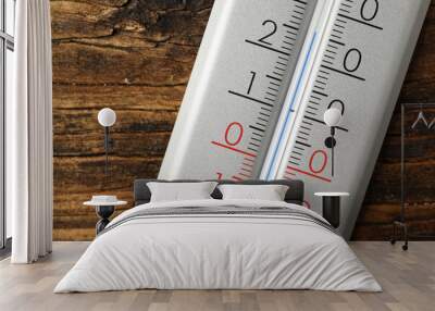 Modern weather thermometer on wooden background, closeup Wall mural