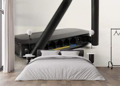 Modern Wi-Fi router on light grey marble background, closeup Wall mural