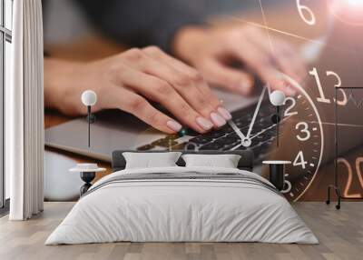 Multiple exposure of woman working on laptop, calendar and clock Wall mural