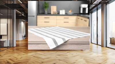 Napkin on wooden table in kitchen. Mockup for design Wall mural