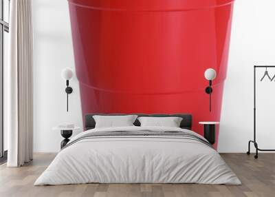 New red plastic cup on white background Wall mural