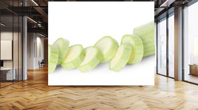 One fresh cut zucchini isolated on white, above view Wall mural