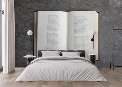 open book on grey stone table, top view Wall mural