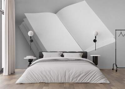 Open book with blank pages on grey background Wall mural