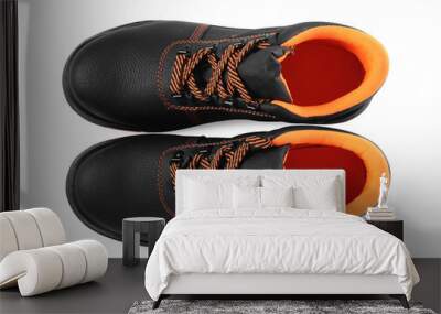 Pair of comfortable working boots isolated on white, top view Wall mural