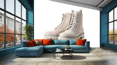 Pair of stylish boots on white background Wall mural