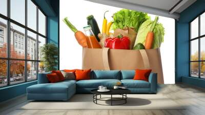 Paper bag with vegetables and bottle of juice on white background, closeup Wall mural