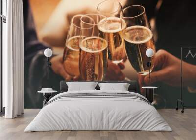 People clinking glasses with sparkling wine indoors , closeup Wall mural