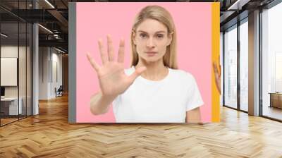 People showing stop and time out gestures on different color backgrounds. Collage with photos Wall mural