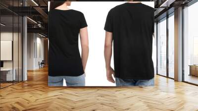 People wearing black t-shirts on white background, back view. Mockup for design Wall mural