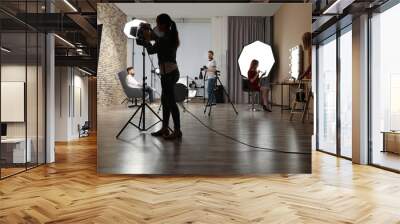 photo studio with professional equipment and team of workers Wall mural