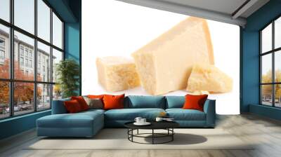 Pieces of delicious parmesan cheese on white background Wall mural