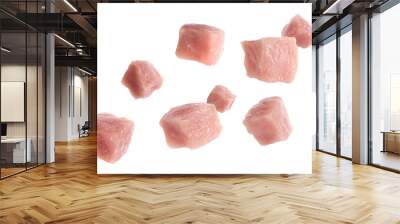 Pieces of raw pork for goulash flying on white background Wall mural