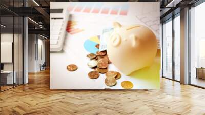 Piggy bank and money on light table. Space for text Wall mural