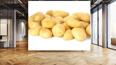 Pile of fresh young potatoes isolated on white Wall mural