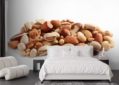 Pile of mixed organic nuts on white background Wall mural