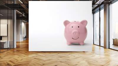 Pink piggy bank on white background. Money saving Wall mural