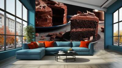 Plate with slice of tasty homemade chocolate cake on table Wall mural