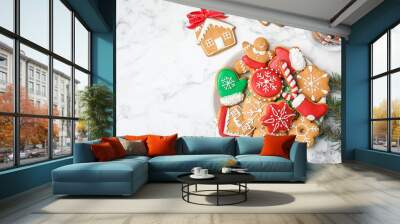 Plate with tasty homemade Christmas cookies on table, top view Wall mural