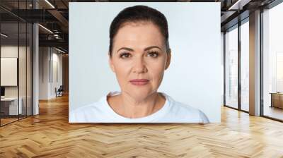 Portrait of beautiful older woman on white background Wall mural