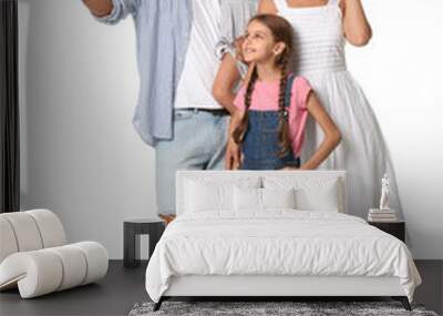 Portrait of happy family on white background Wall mural