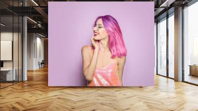 Portrait of smiling young woman with dyed straight hair on color background. Trendy hairstyle design Wall mural