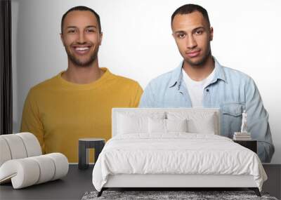 Portrait of twin brothers on white background Wall mural