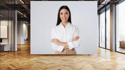 Portrait of young businesswoman on white background Wall mural