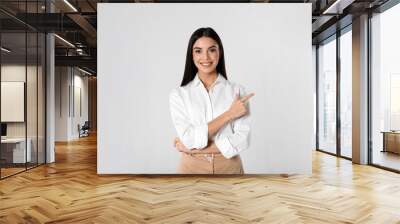 Portrait of young businesswoman on white background Wall mural