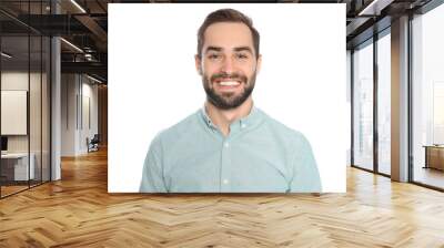 Portrait of young man laughing on white background Wall mural