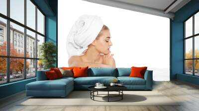 Portrait of young pretty woman with towel on white background Wall mural