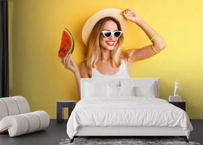 Pretty young woman with juicy watermelon on color background Wall mural