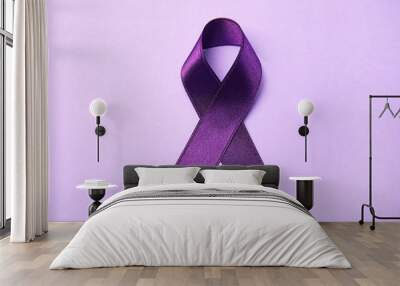 Purple ribbon on lilac background, top view. Domestic violence awareness Wall mural